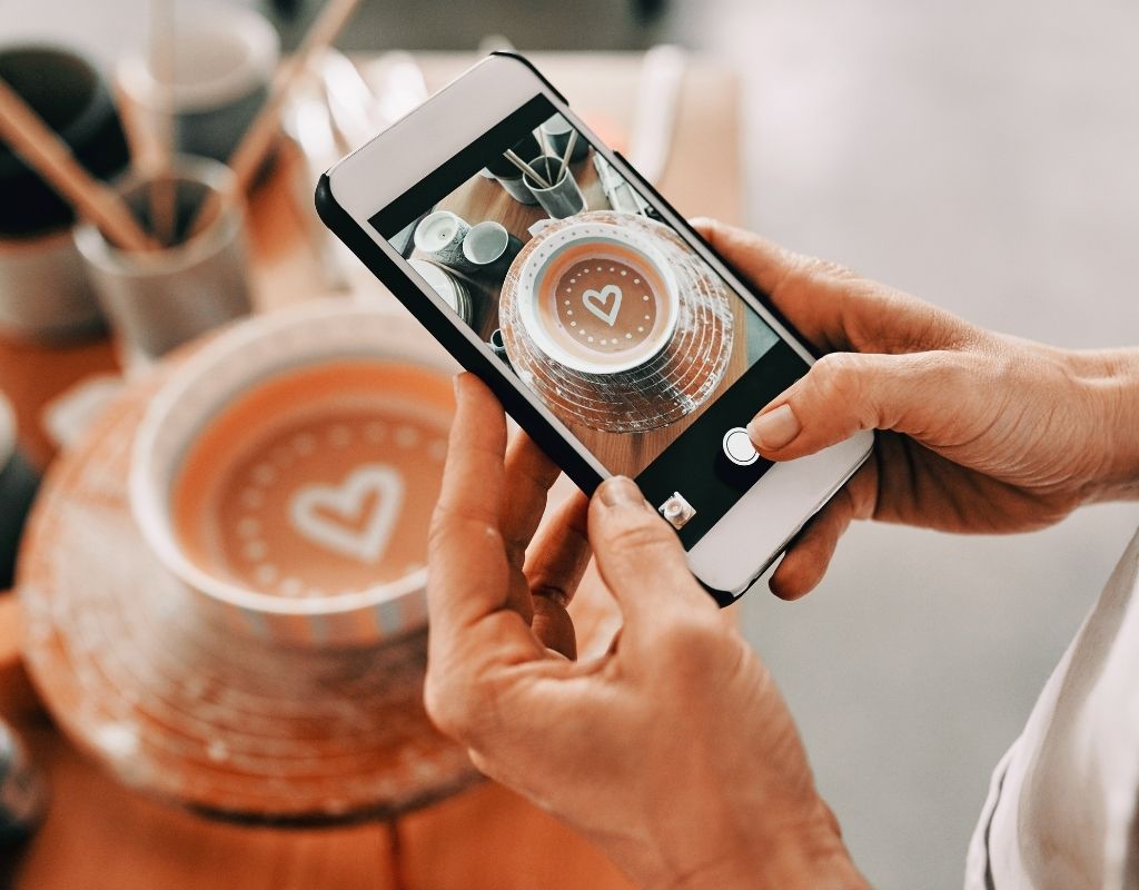 close up of person creating social media post